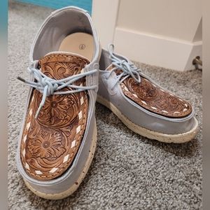 Tooled‎ leather slip on shoes